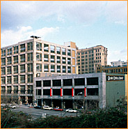 View from Hill Street of Grand Central Market, Lyon Building and parking structure